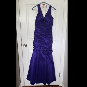 Long blue ruched evening dress
